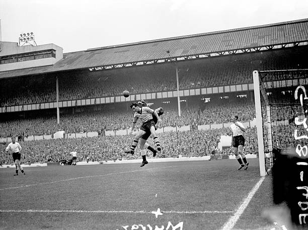 tottenham-hotspur-goalkeeper-john-hollowbread-punches-clear-from-picture-id637448632