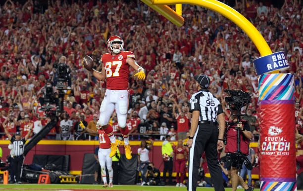 Travis Kelce of the Kansas City Chiefs celebrates after a touchdown during the 2nd half of the game against the Las Vegas Raiders at Arrowhead...