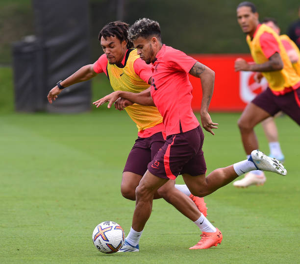 Trent Alexander-Arnold of Liverpool with Luis Diaz of Liverpool during a training session at AXA Training Centre on August 04, 2022 in Kirkby,...