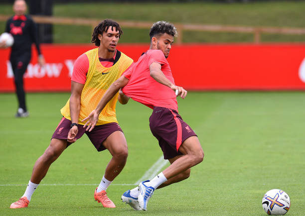 Trent Alexander-Arnold of Liverpool with Luis Diaz of Liverpool during a training session at AXA Training Centre on August 04, 2022 in Kirkby,...