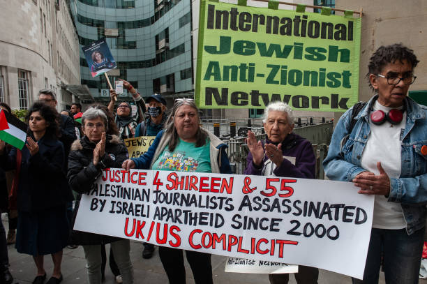 Tributes are paid to murdered Palestinian journalist Shireen Abu Akleh at a protest and vigil at BBC Broadcasting House on May 12, 2022 in London,...