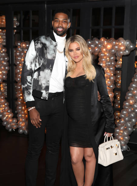 Tristan Thompson and Khloe Kardashian pose for a photo as Remy Martin celebrates Tristan Thompson's Birthday at Beauty & Essex on March 10, 2018 in...