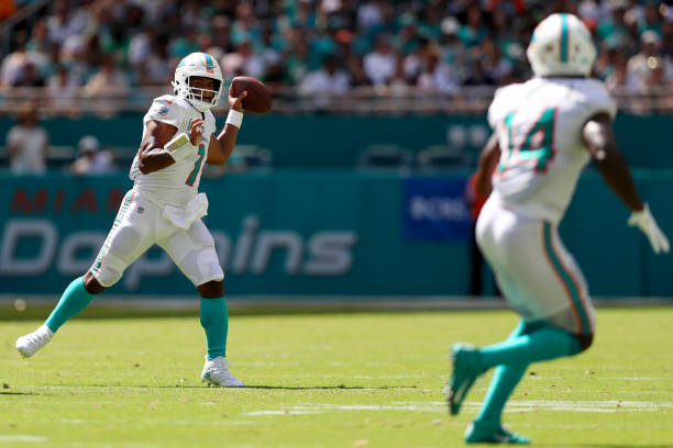 Tua Tagovailoa of the Miami Dolphins throws a pass against the New England Patriots during the second half at Hard Rock Stadium on September 11, 2022...