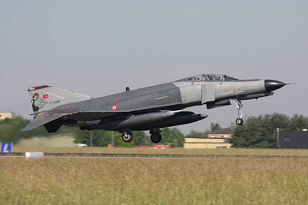 A Turkish F-4E Phantom with Israeli built Elta ECM pod takes off from Lechfeld Airfield, Germany, during the bi-annual ELITE exercise.