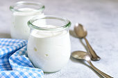 Two portions of fresh natural  homemade organic yogurt