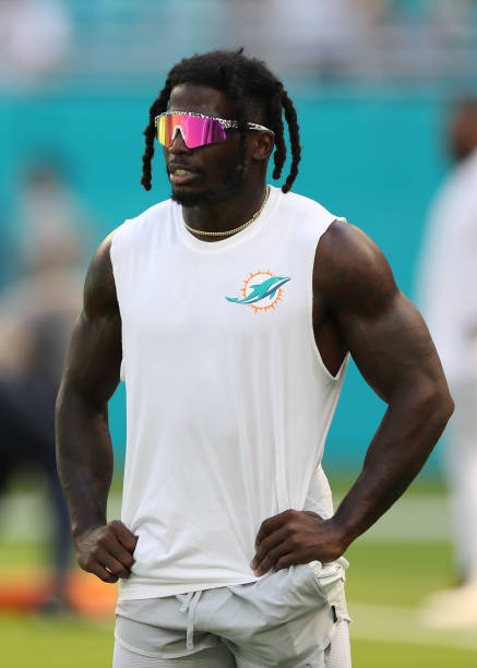 Tyreek Hill of the Miami Dolphins looks on prior to playing the Buffalo Bills at Hard Rock Stadium on September 25, 2022 in Miami Gardens, Florida.