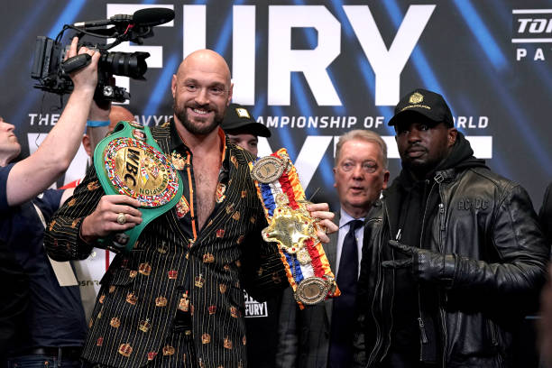 Tyson Fury and Dillian Whyte during a press conference at Wembley Stadium, London. Picture date: Wednesday April 20, 2022.
