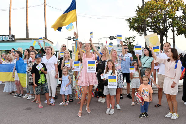 FRA: Ukrainian Refugee Families Demonstrate For Peace Near Palais Du Festival In Cannes