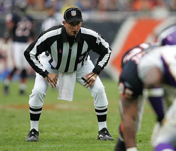 Umpire Carl Madsen awaits a play during a game between the Chicago Bears and the Minnesota Vikings on October 14, 2007 at Soldier Field in Chicago,...