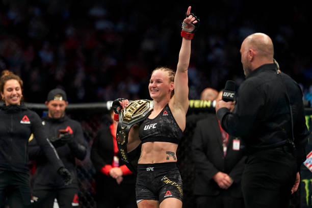 Valentina Shevchenko of Kyrgyzstan celebrates her TKO victory over Katlyn Chookagian in their women's flyweight championship bout during the UFC 247...