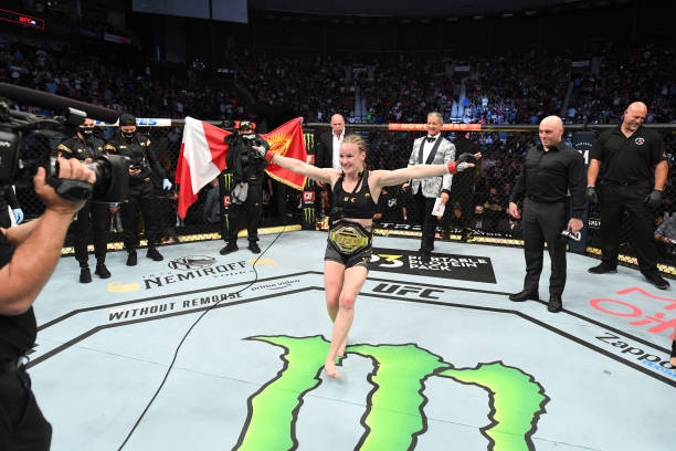 Valentina Shevchenko of Kyrgyzstan reacts after defeating Jessica Andrade of Brazil in their UFC women's flyweight championship bout during the UFC...