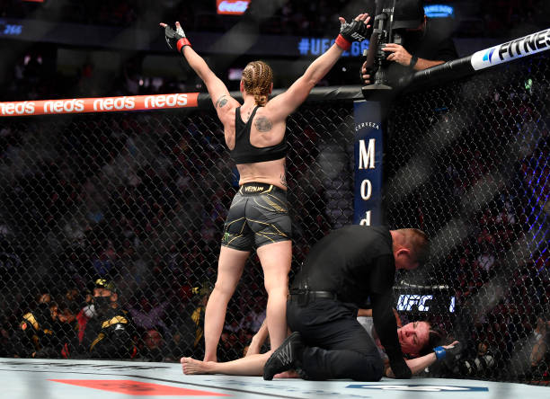 Valentina Shevchenko of Kyrgyzstan reacts to her knockout of Lauren Murphy in their UFC flyweight championship fight during the UFC 266 event on...