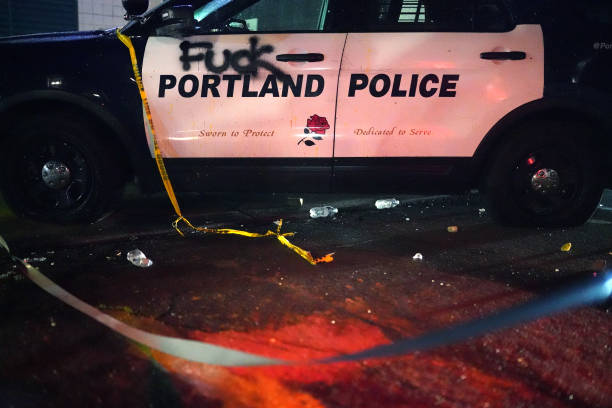 Vandalized police cruiser is seen here at the Portland Police Bureau North Precinct during a protest against police brutality and racial in justice...