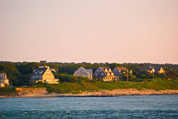 various waterfront homes at sunset along coast in woods hole cape cod picture id128100745?k=20&m=128100745&s=612x612&w=0&h=sF4AXS2VXG5duD9XM