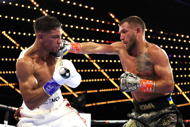 Vasiliy Lomachenko punches Jamaine Ortiz during their lightweight bout at The Hulu Theater at Madison Square Garden on October 29, 2022 in New York...