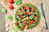 vegan broccoli zucchini pizza crust with vegetables