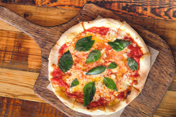 vegetarian italian pizza margarita with mozzarella cheese tomatoes picture id1275163576?k=20&m=1275163576&s=612x612&w=0&h=mlZdRejqpMLZ8l8WWvGUMUTRpIXVBx 2 mEWIXbbftw=