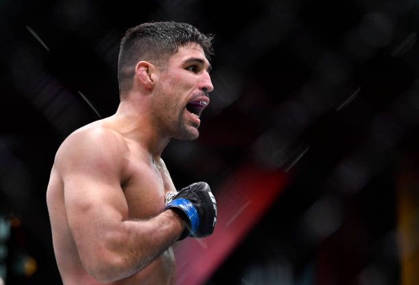 Vicente Luque reacts after his victory over Tyron Woodley in their welterweight fight during the UFC 260 event at UFC APEX on March 27, 2021 in Las...