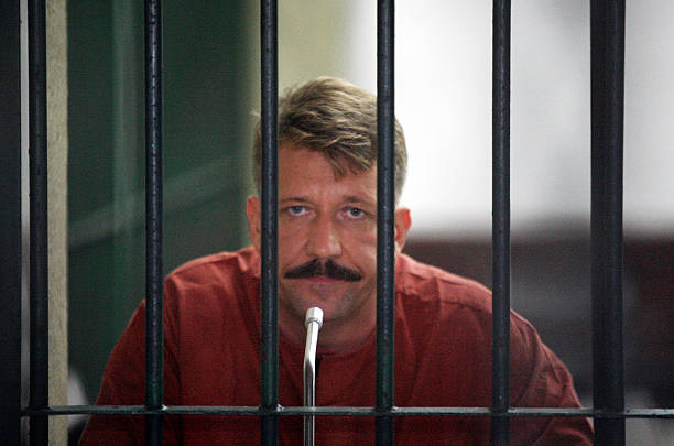 Viktor Bout sits inside a detention cell at Bangkok Supreme Court on July 28 in Bangkok, Thailand. A Thai court postponed the extradition hearing,...
