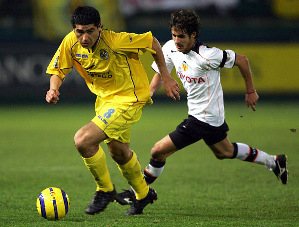 Villarreal 's Argentine Juan Roman Riquelme vies for the ball with Valencia's Argentine Pablo Aimar during their Spanish League football match at the...