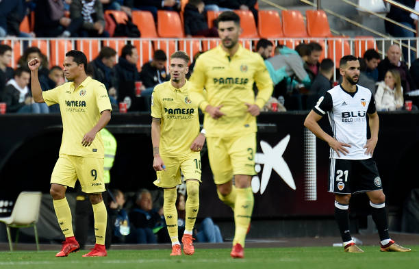Villarreal's Colombian forward Carlos Bacca celebrates after scoring during the Spanish league football match Valencia CF and Villarreal CF at...