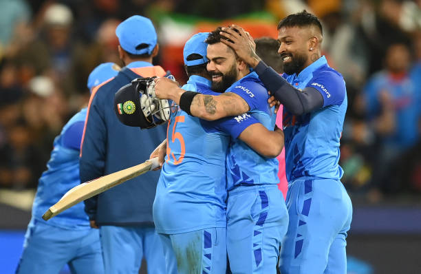Virat Kohli celebrates with Rohit Sharma and Hardik Pandya after India won the ICC Men's T20 World Cup match between India and Pakistan at Melbourne...