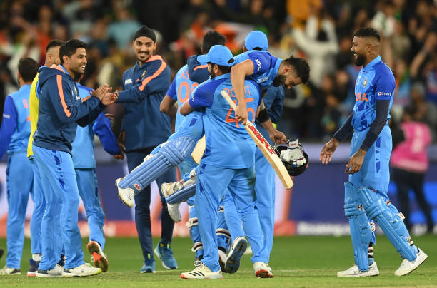 Virat Kohli celebrates with Rohit Sharma and Hardik Pandya after India won the ICC Men's T20 World Cup match between India and Pakistan at Melbourne...