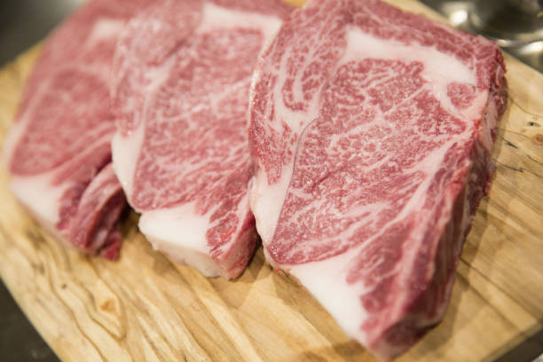 wagyu beef steaks sit on a table picture