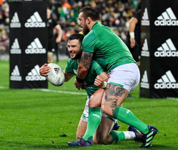 Wellington , New Zealand - 16 July 2022; Robbie Henshaw of Ireland celebrates with teammate Andrew Porter after scoring his side's third try during the Steinlager Series match between the New Zealand and Ireland at Sky Stadium in Wellington, New Zealand. (Photo By Brendan Moran/Sportsfile via Getty Images)