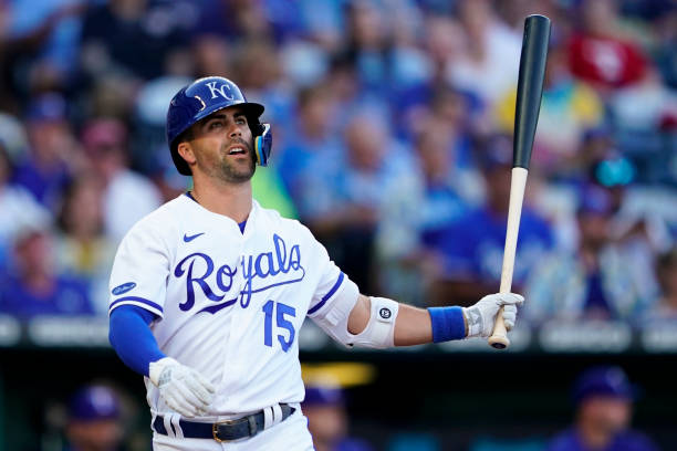 Whit Merrifield of the Kansas City Royals watches a ball go foul after a Texas Rangers pitch during the first inning at Kauffman Stadium on June 28,...