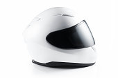 A white motorcycle helmet on a white background