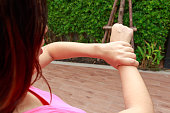 Woman hands pain or holding arm in garden concept.