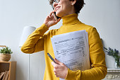 Woman with individual income tax return form