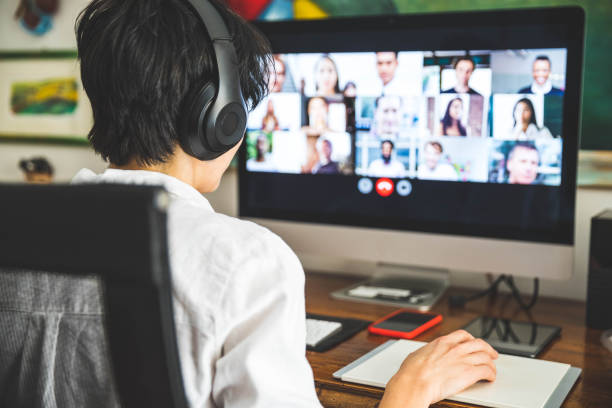 woman working at home having a video conference with colleagues picture id1217123258?k=20&m=1217123258&s=612x612&w=0&h=LZmoK37EEExxdQMbnQvYnecpea1hKhEASR5XeIr7JSc= - The Internet And Business: Revolutionary Combo