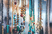 Women beads and necklace in jewerly market. Bali island