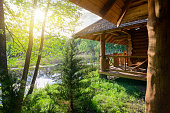 Wooden house and river