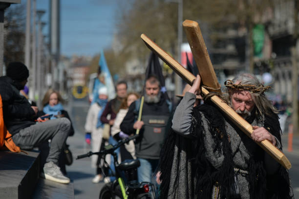 Worshipers during a Solemn Procession on Good Friday 2021, walking and praying from the General Post Office to the 'Papal Cross' in Dublin's Phoenix...
