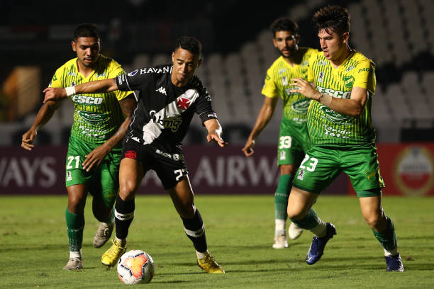 Yago Pikachu of Vasco da Gama competes for the ball with Eugenio Isnaldo of Defensa y Justicia during a round of sixteen second leg match between...