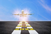 Year 2022 to 2025 on runway with commercial plane on blue sky background