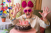 100 years old birthday cake to old woman