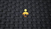 Yellow human shape among dark ones. Standing out of crowd concept