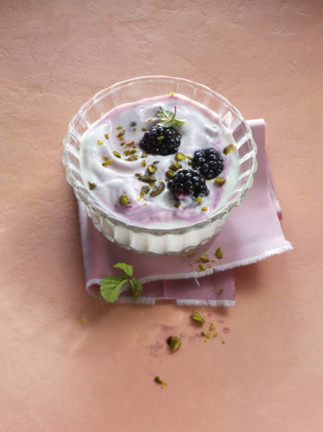 Yogurt with blackberries and pistachios