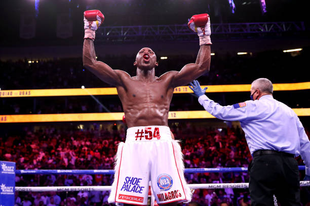 Yordenis Ugas celebrates after finishing 12 rounds against Manny Pacquiao in their WBA welterweight title fight at T-Mobile Arena on August 21, 2021...