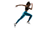 Young african woman running or jogging isolated on white studio background.
