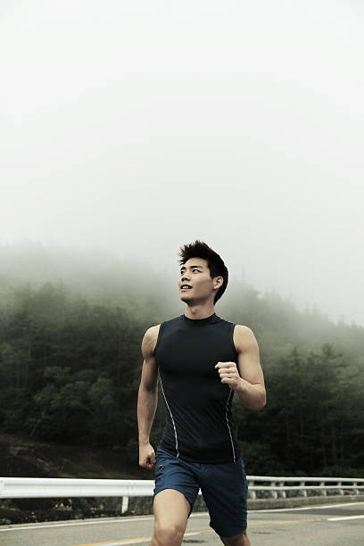 young man,outdoor exercise, - physical activity men stock pictures, royalty-free photos & images