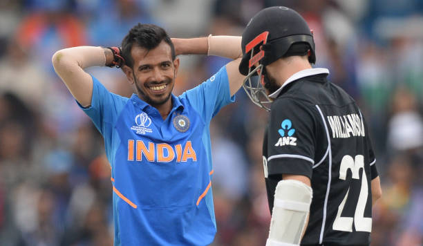 Team India - Yuzvendra Chahal of India smiles at Kane Williamson of New Zealand during the ICC Cricket World Cup Semi Final Match between India and New Zealand at...