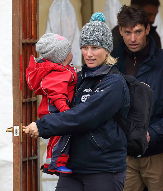 zara-phillips-carries-daughter-mia-tindall-as-she-and-harry-meade-picture-id467920312