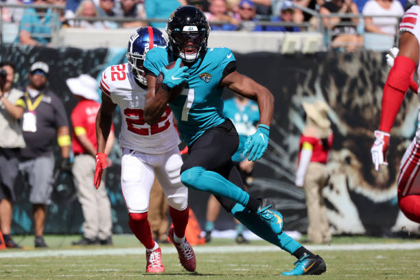 Zay Jones of the Jacksonville Jaguars runs with the ball in the first quarter against the New York Giants at TIAA Bank Field on October 23, 2022 in...