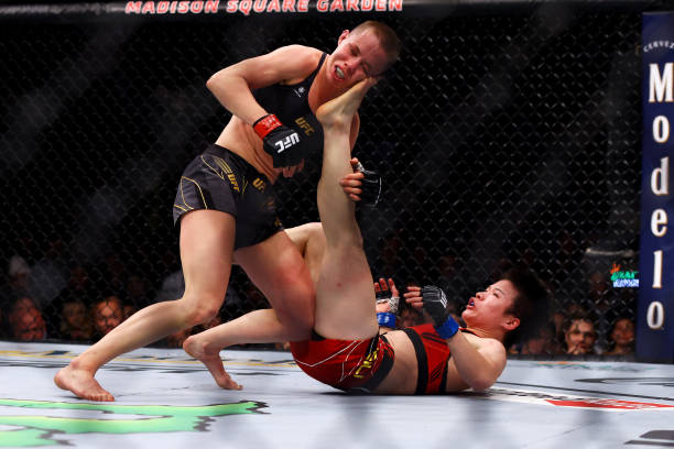 Zhang Weili kicks Rose Namajunas in their strawweight title bout during the UFC 268 event at Madison Square Garden on November 06, 2021 in New York...