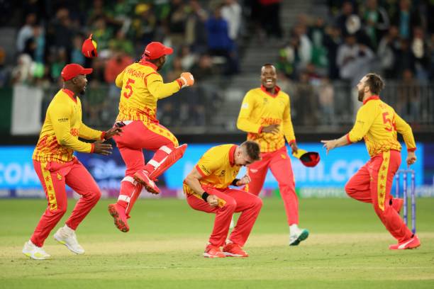 Zimbabwe's players celebrate their victory at the end of the ICC mens Twenty20 World Cup 2022 cricket match between Pakistan and Zimbabwe in Perth on...